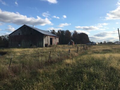 1860-65 hay press barn with large hand hewn timber beams