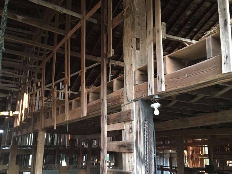 1860-65 hay press barn with large hand hewn timber beams